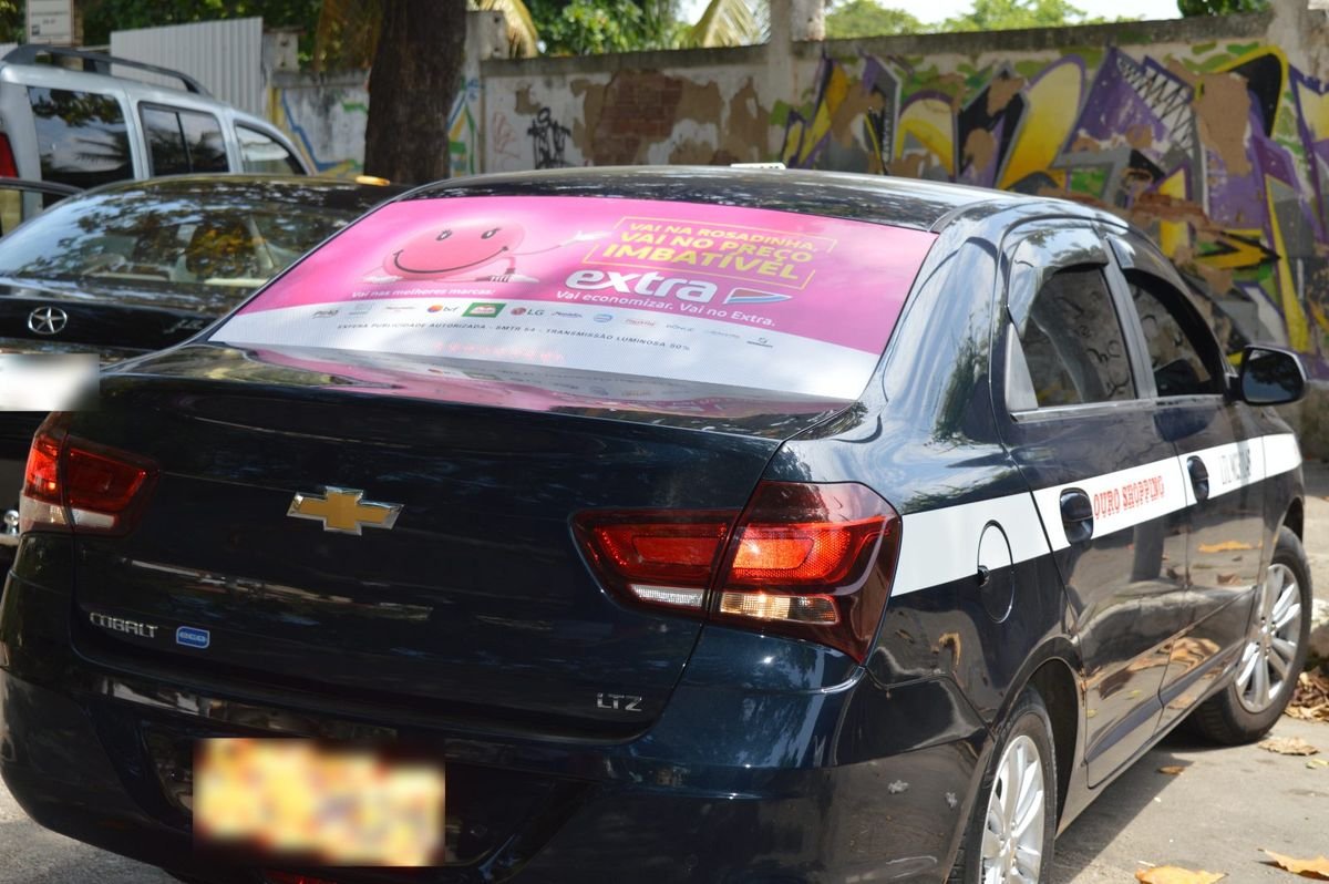 Táxi Chevrolet Cobalt em Niterói com Taxidoor do Extra